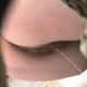 A woman is observed pissing and shitting (at the same time) into a toilet and then wiping herself from a hole-in-the-wall perspective. About 2 minutes.
